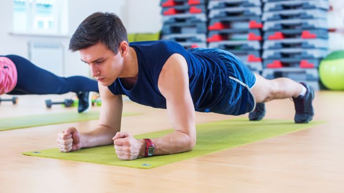 man doing plank exercise