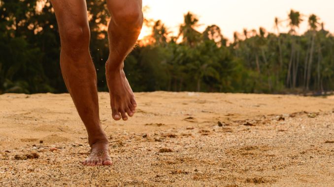 barefoot-running-beach-sunset
