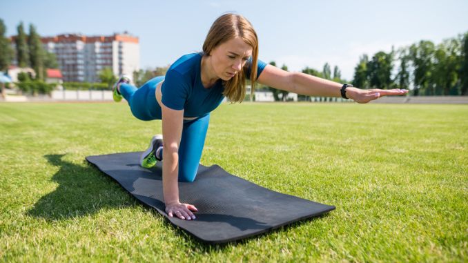 stretching on mat - exercises to improve balance