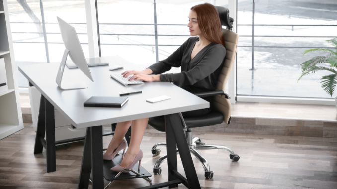 working-with-computer-at-office - Thoracic Mobility