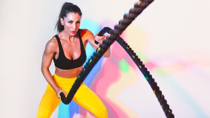 Fit Woman Training Hardwith Ropes