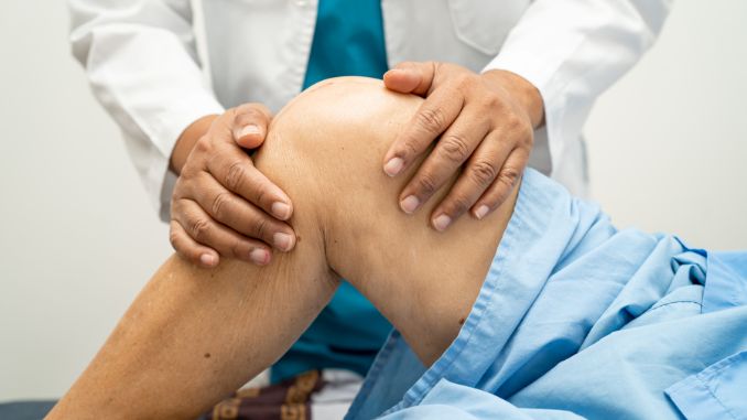 asian-doctor-physiotherapist-examining - most common causes of falls in the elderly